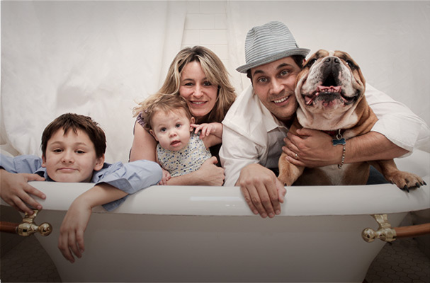 a portrait of a family in a bathtub